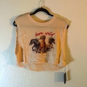 Sleeveless peach colored crop top.